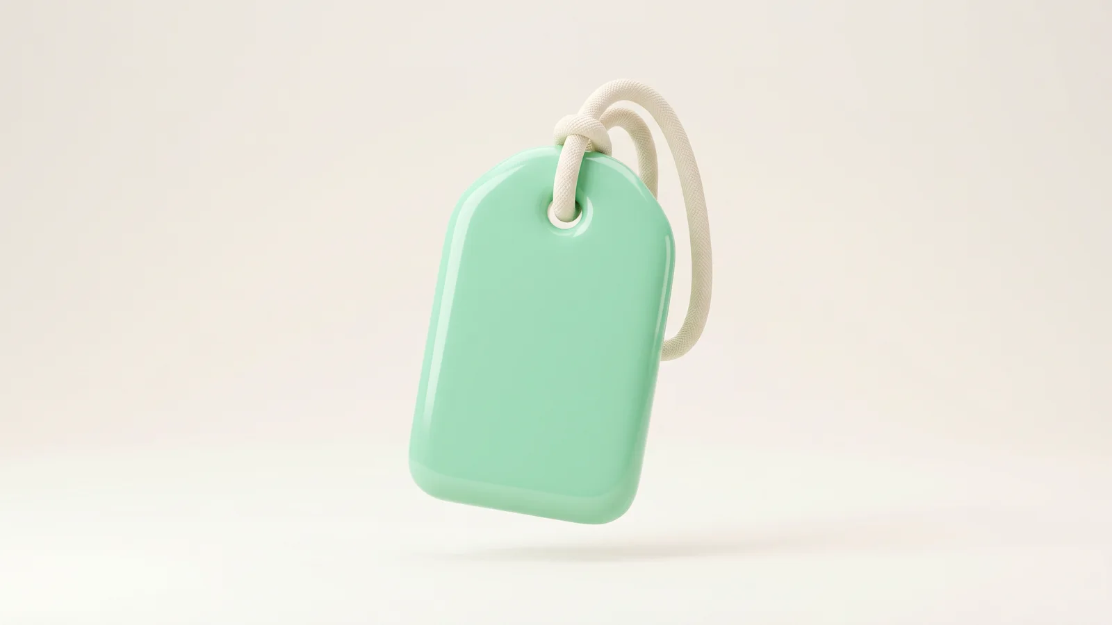 A glossy oversized price tag with a soft cord loop, representing influencer rate card benchmarks by platform and deliverable.